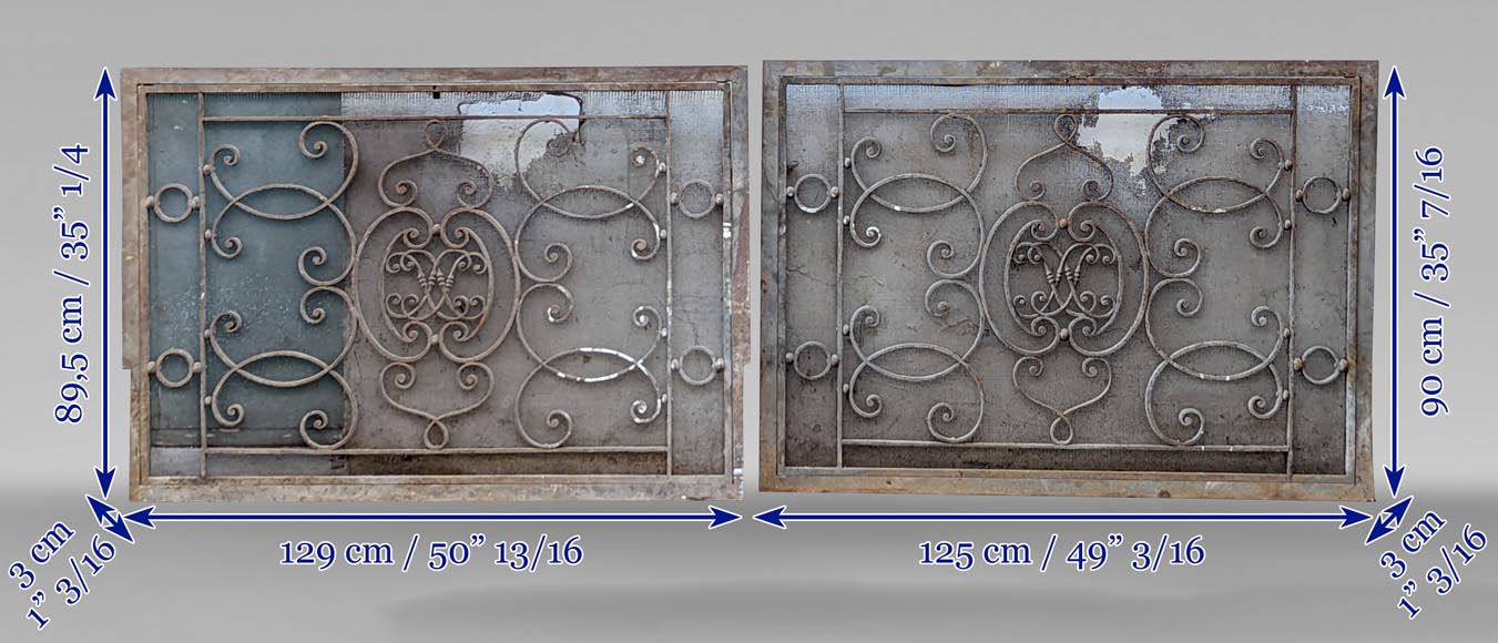 Pair of wrought iron front radiators with intertwined L Pair of wrought iron front radiators with intertwined L-9