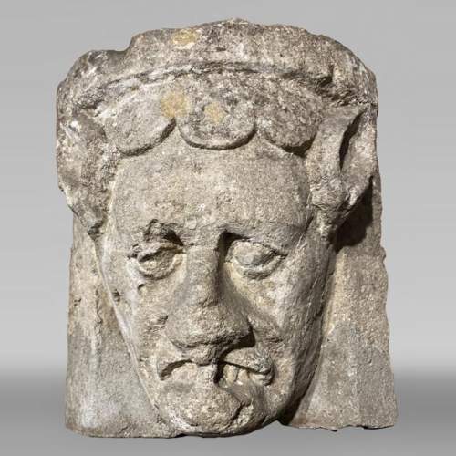 Medieval capital with demon's head, 12th century