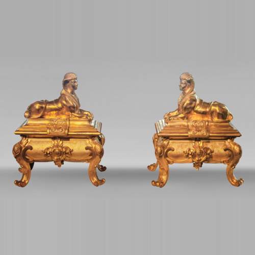Pair of Napoleon III style gilt-bronze chenets featuring sphinxes