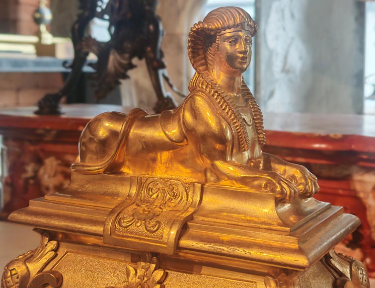 Pair of Napoleon III style gilt-bronze chenets featuring sphinxes Pair of Napoleon III style gilt-bronze chenets featuring sphinxes-3