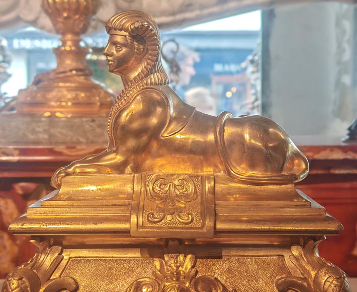 Pair of Napoleon III style gilt-bronze chenets featuring sphinxes Pair of Napoleon III style gilt-bronze chenets featuring sphinxes-4