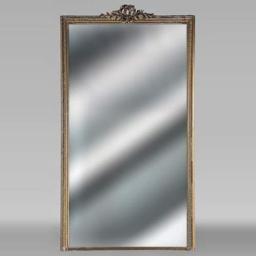 Large Louis XVI style trumeau with richly decorated laurel wreath, bronzine