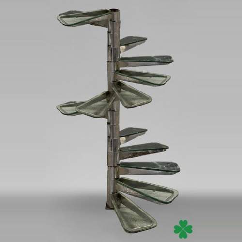 Spiral staircase in glass and chromed metal