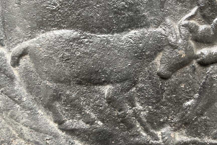 Fireback from the 18th century featuring a love playing with a goat Fireback from the 18th century featuring a love playing with a goat-2