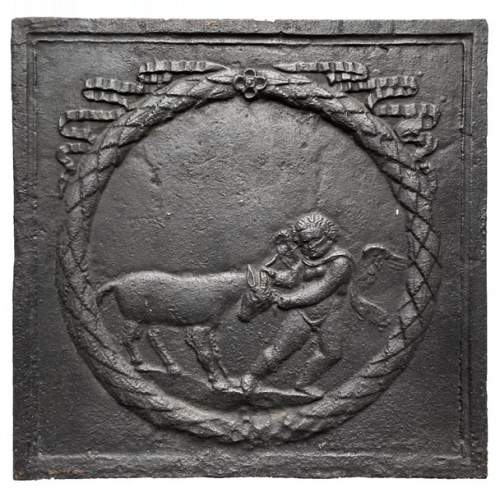 Fireback from the XVIIIth century showing a lover having fun with a goat