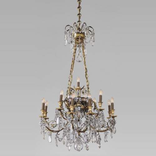 Louis XVI style chandelier in gilt bronze and crystals decorated with rams heads
