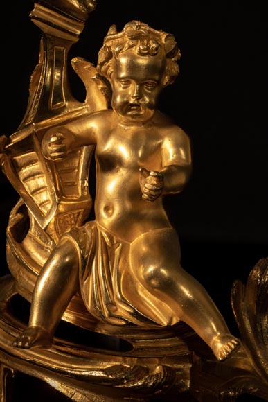 Pair of Louis XV style andirons with putti decoration Pair of Louis XV style andirons with putti decoration-3