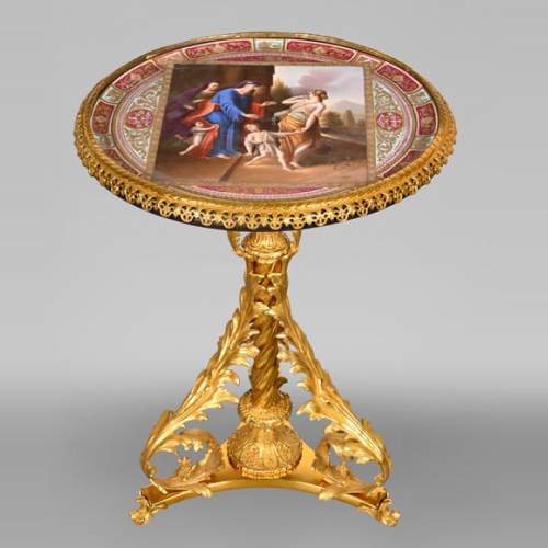 Gilt bronze guéridon with painted porcelain plaque, after Adrian VAN DER WERFF, “The Dismissal of Hagar”