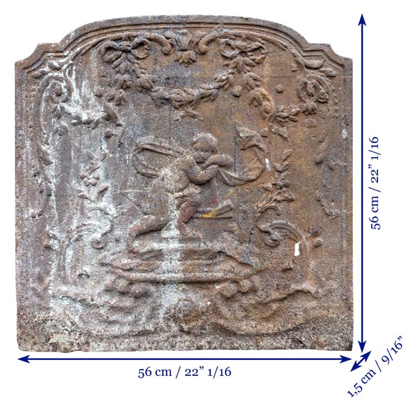 Fireback from the 19th century in the Louis XV style with the Fireback from the 19th century in the Louis XV style with the