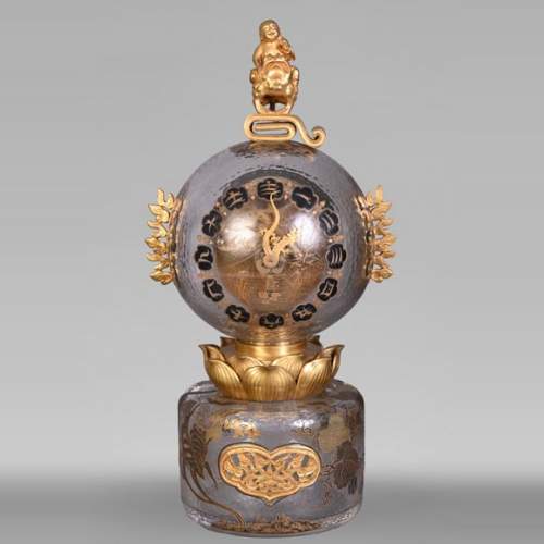 L’Escalier de CRISTAL – Japonist Glass Clock in the Shape of a Sphere Emerging from a Lotus Flower