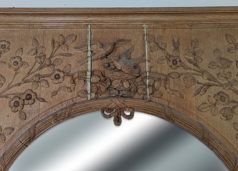 Louis XVI style trumeau in carved oak adorned with a bird's nest framed by floral decoration Louis XVI style trumeau in carved oak adorned with a bird's nest framed by floral decoration-1