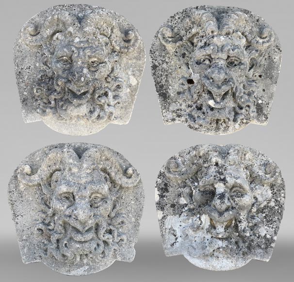 Set of Four Carved Stone Medallions Depicting Satyr Faces-0