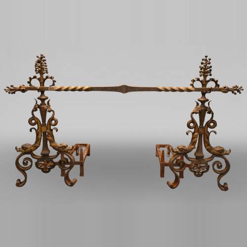 Pair of andirons with flowers and dolphins