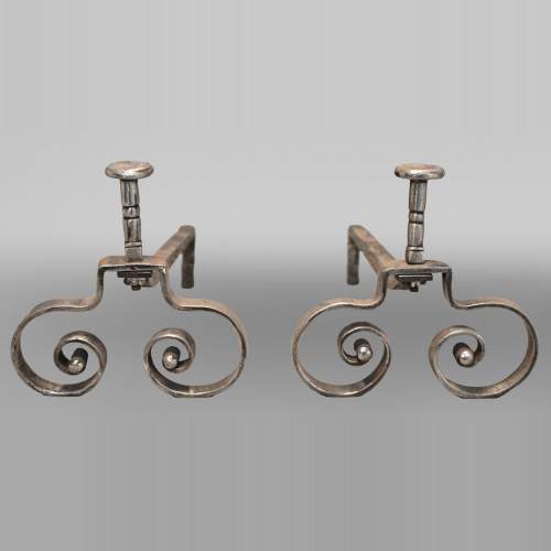 Pair of symmetrical scrolled andirons