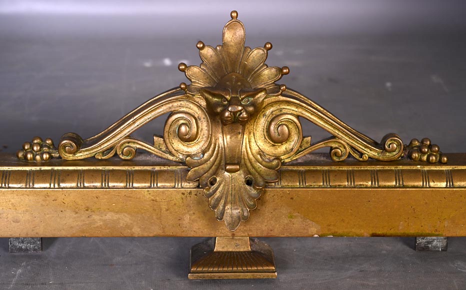 Pair of Egyptian-style gilt-bronze firedogs with confronting griffins-4