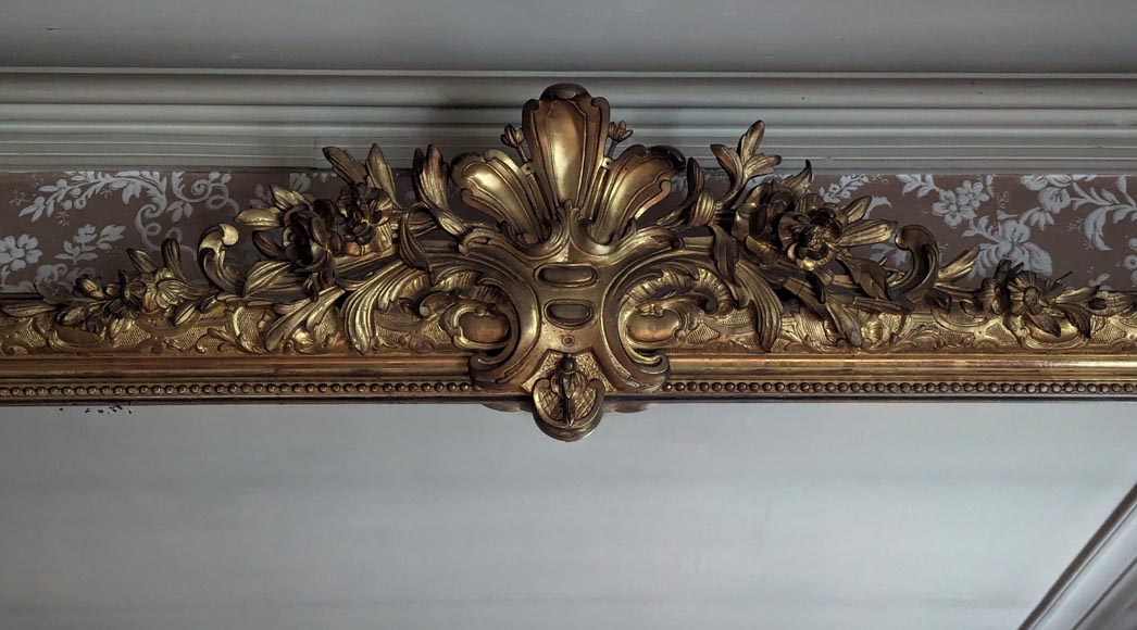Large Regence style gilded trumeau surmounted by a palm leaf Large Regence style gilded trumeau surmounted by a palm leaf-1
