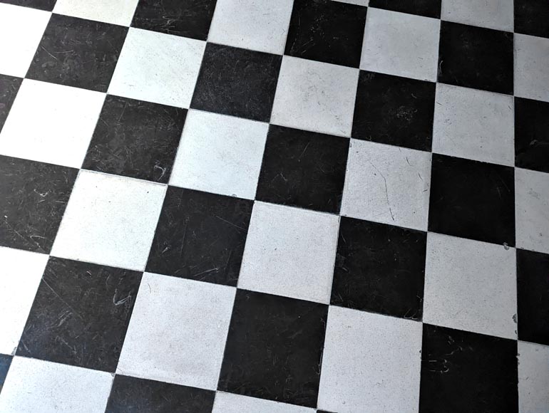 Checkerboard floor in stone and black marble . Checkerboard floor in stone and black marble .-1