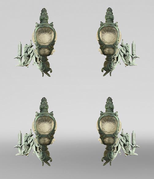4 cast iron wall lights, based on models from the Pont Alexandre III 4 cast iron wall lights, based on models from the Pont Alexandre III-0