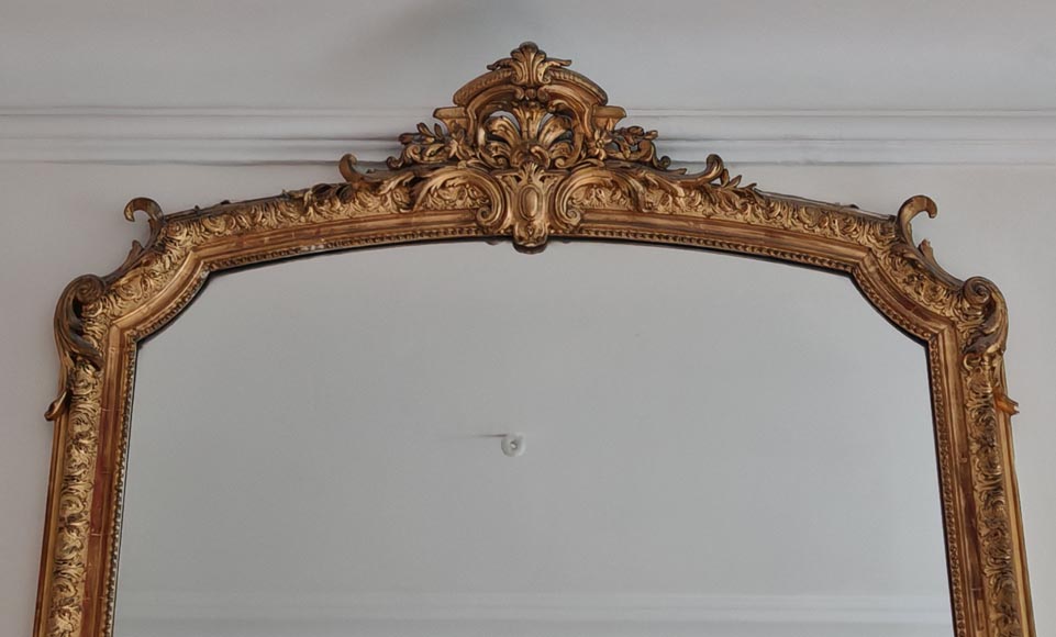 Large Regence style gilded trumeau topped by a shell Large Regence style gilded trumeau topped by a shell-1