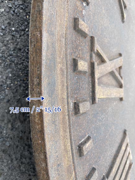 Large cast iron public clock face, with raised Roman numerals, signed Large cast iron public clock face, with raised Roman numerals, signed