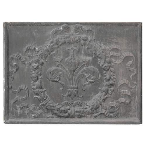 Napoleon III style fireback with a stylized fleur-de-lis, surrounded by a wreath of plants