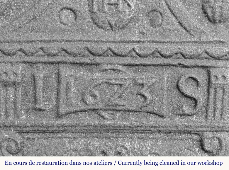  Cast iron fireback in a semicircle, dated 1623-2