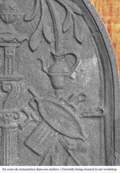  Cast iron fireback in a semicircle, dated 1623-4