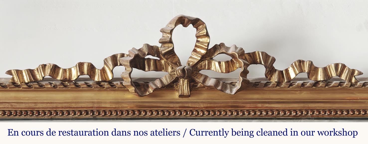 Louis XVI style gilded trumeau topped with a knotted ribbon Louis XVI style gilded trumeau topped with a knotted ribbon-1