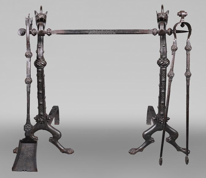 E. LARCHEVÊQUE, pair of wrought iron fire dogs with dragon heads E. LARCHEVÊQUE, pair of wrought iron fire dogs with dragon heads-0