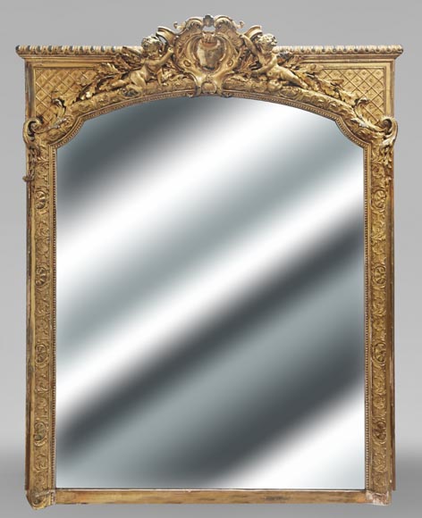 A richly gilded trumeau in the Napoleon III style, decorated with putti-0