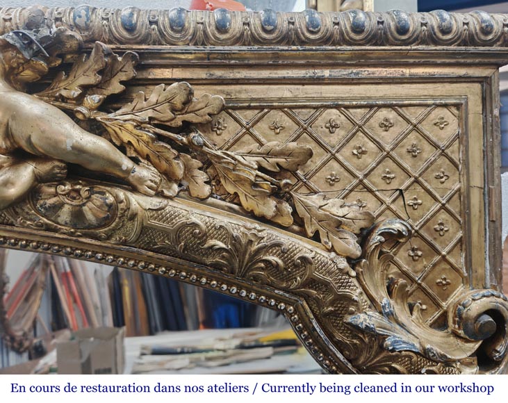 A richly gilded trumeau in the Napoleon III style, decorated with putti-6
