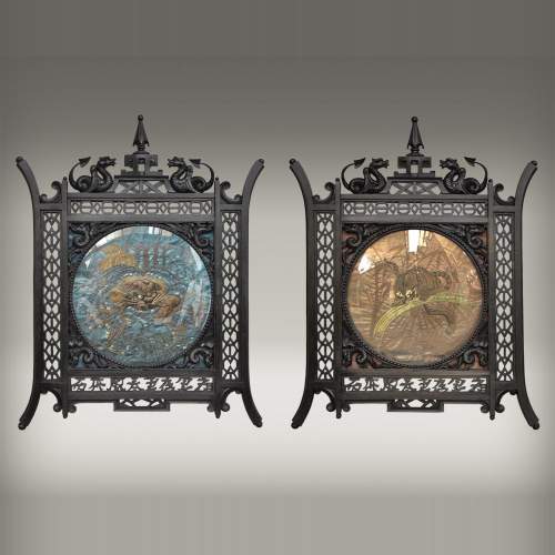 Pair of Japanese-blackened wooden frames decorated with embroidered silk