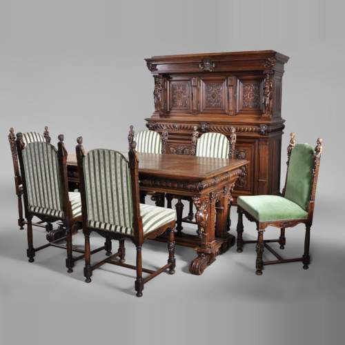 Antique Neo-Renaissance style dining room made out of carved walnut with grotesques and fantastics animals decor