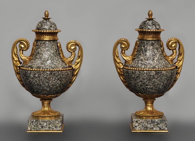 Pair of granite and gilded bronze cassolettes after a model by Pierre Gouthière Pair of granite and gilded bronze cassolettes after a model by Pierre Gouthière-0