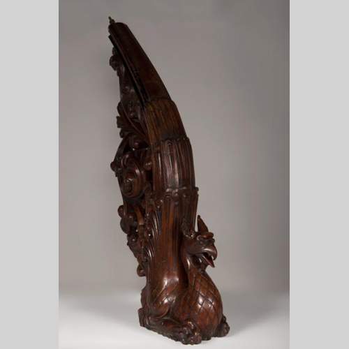 Stair banister with griffin decor made out of mahogany circa 1910