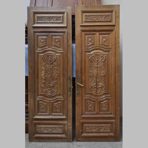 False pair of antique  carved oak doors from the 19th century