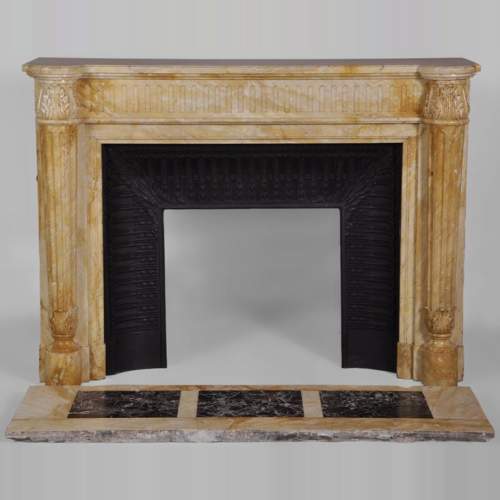 Beautiful antique Louis XVI style fireplace in Yellow from Siena marble with half-columns