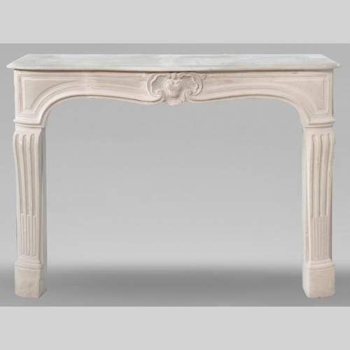 Louis XV style stone fireplace