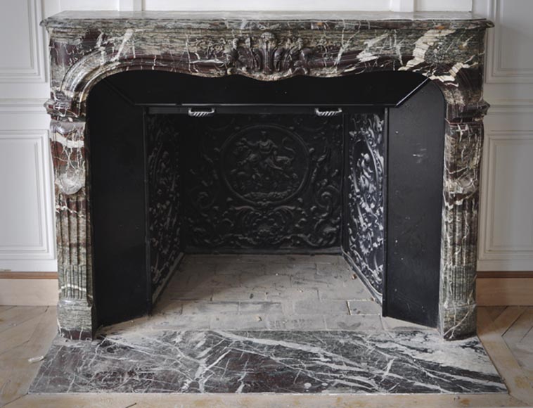Beautiful antique Regence style fireplace in Campan Grand Melange marble, 19th c. Beautiful antique Regence style fireplace in Campan Grand Melange marble, 19th c.-0