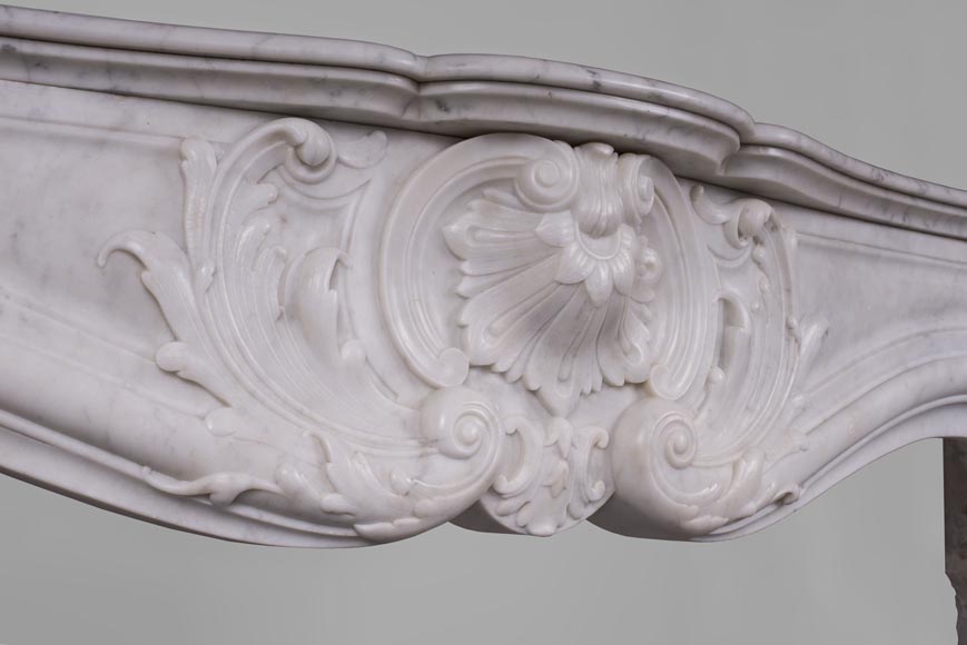 Beautiful antique Louis XV style fireplace with rich decor in white Carrara marble Beautiful antique Louis XV style fireplace with rich decor in white Carrara marble-2