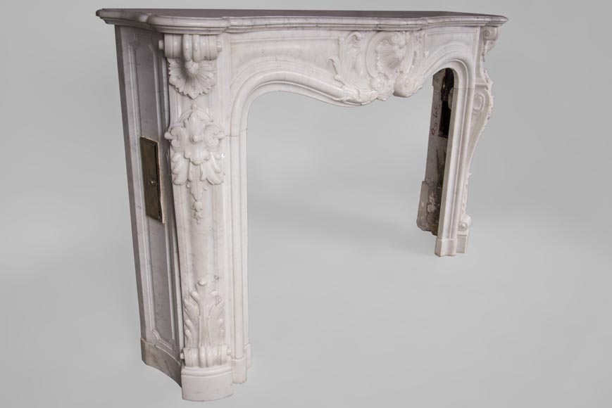 Beautiful antique Louis XV style fireplace with rich decor in white Carrara marble Beautiful antique Louis XV style fireplace with rich decor in white Carrara marble-3
