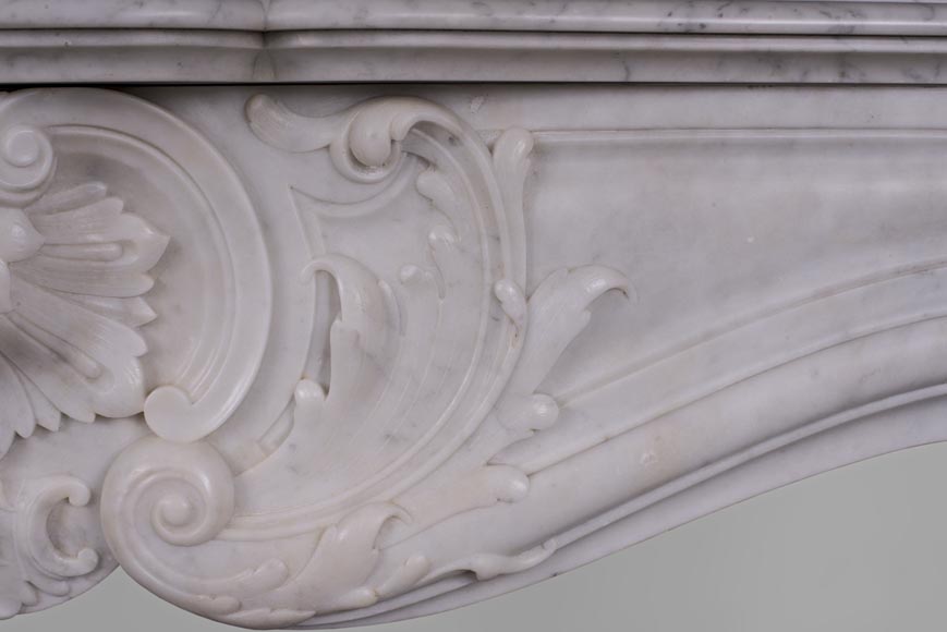 Beautiful antique Louis XV style fireplace with rich decor in white Carrara marble Beautiful antique Louis XV style fireplace with rich decor in white Carrara marble-4