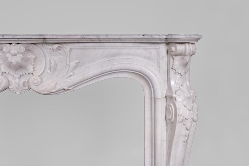 Beautiful antique Louis XV style fireplace with rich decor in white Carrara marble Beautiful antique Louis XV style fireplace with rich decor in white Carrara marble-8