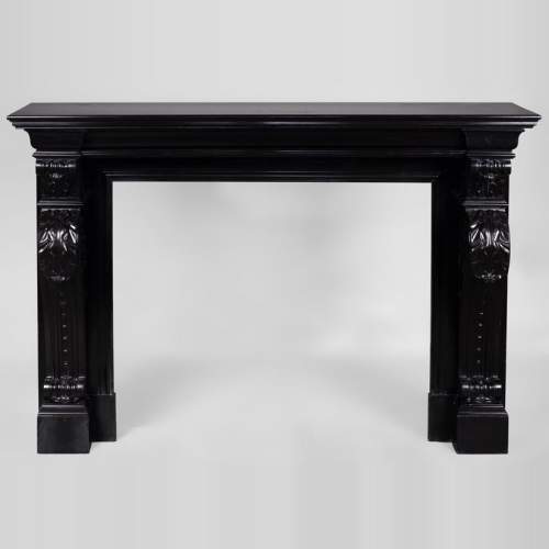 Beautiful antique Napoleon III fireplace with windings and acanthus leaves in Black Belgium marble