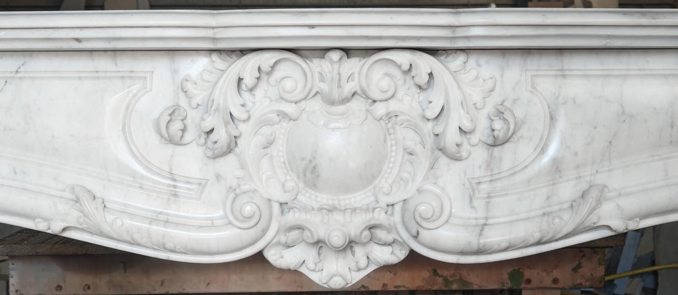 Highly sculpted Louis XV style fireplace in Carrara marble-1