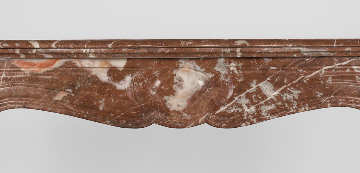 An antique Louis XV style fireplace, Pompadour model, made out of Rouge du Nord marble An antique Louis XV style fireplace, Pompadour model, made out of Rouge du Nord marble-1