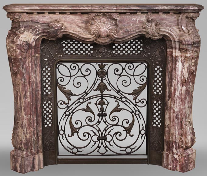 Very beautiful antique Louis XV style opulent fireplace made out of Fleur de Pêcher marble Very beautiful antique Louis XV style opulent fireplace made out of Fleur de Pêcher marble-0