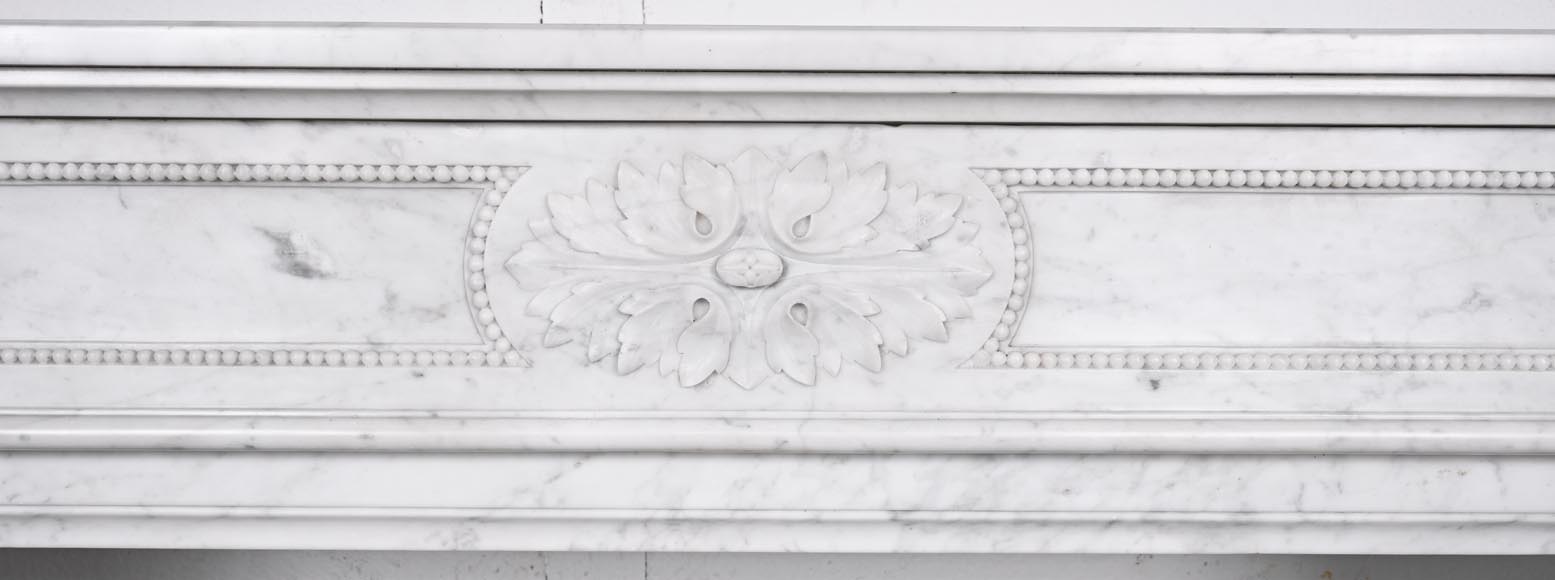 Louis XVI style fireplace in Carrara marble, decorated with acanthus leaves Louis XVI style fireplace in Carrara marble, decorated with acanthus leaves-1