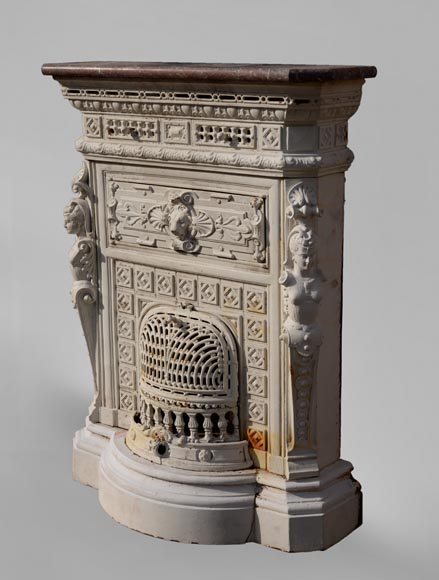 Antique cast iron stove in the Napoleon III style decorated with caryatids Antique cast iron stove in the Napoleon III style decorated with caryatids-5