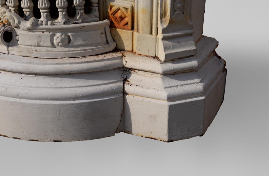 Antique cast iron stove in the Napoleon III style decorated with caryatids Antique cast iron stove in the Napoleon III style decorated with caryatids-9